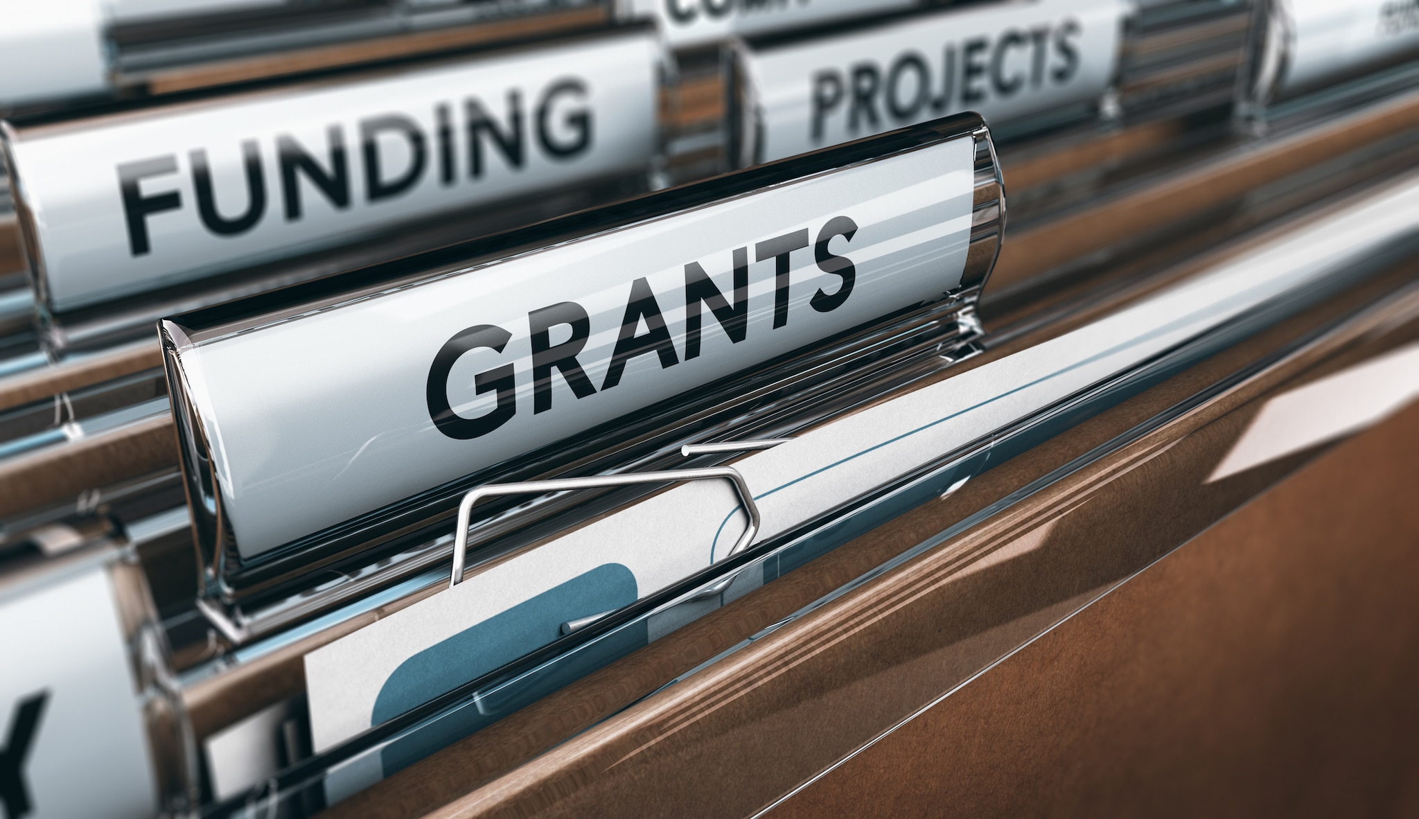 File folders labeled grants, funding, and projects