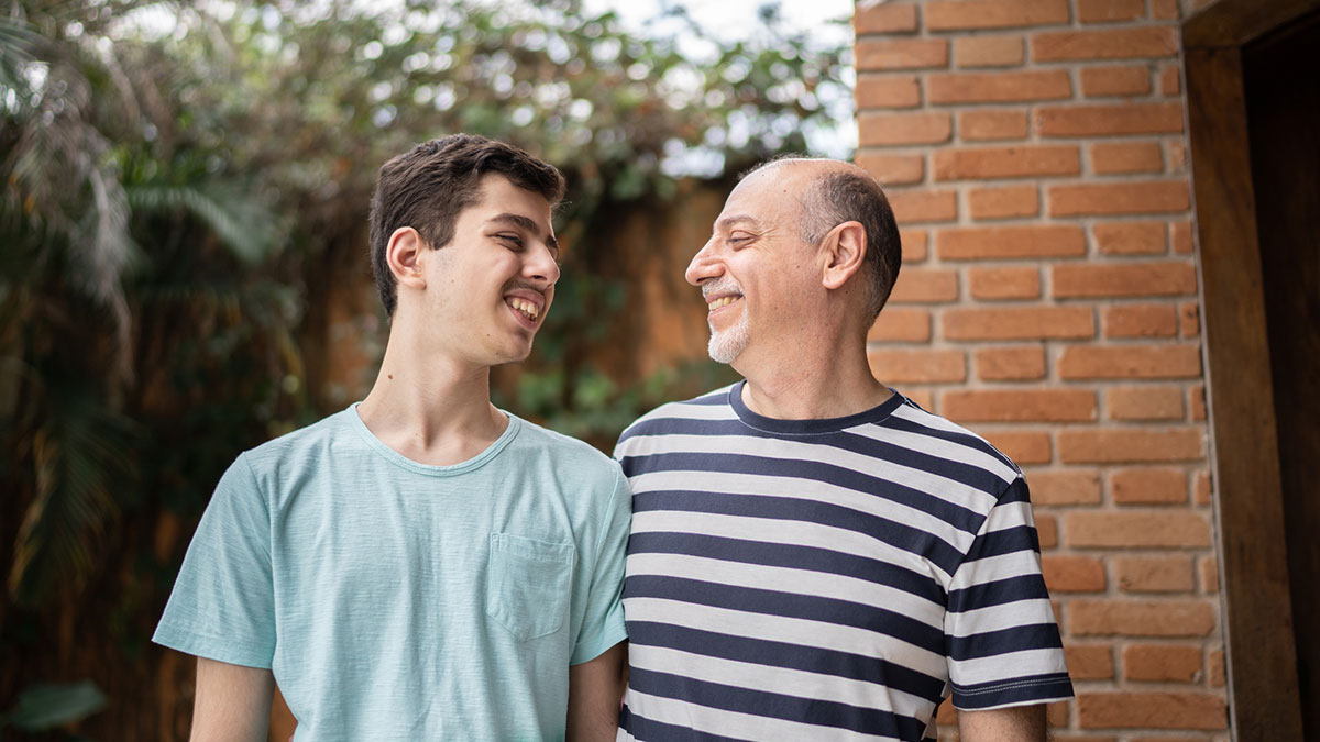 father with son smiling