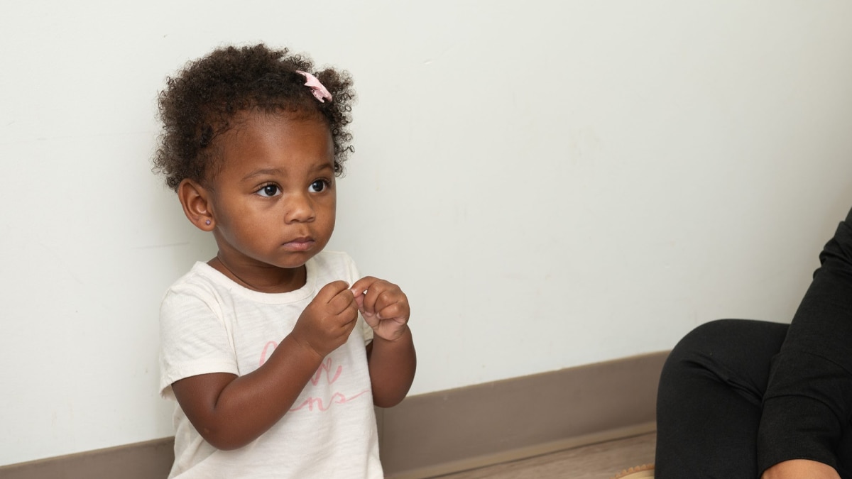 Toddler using American Sign Language