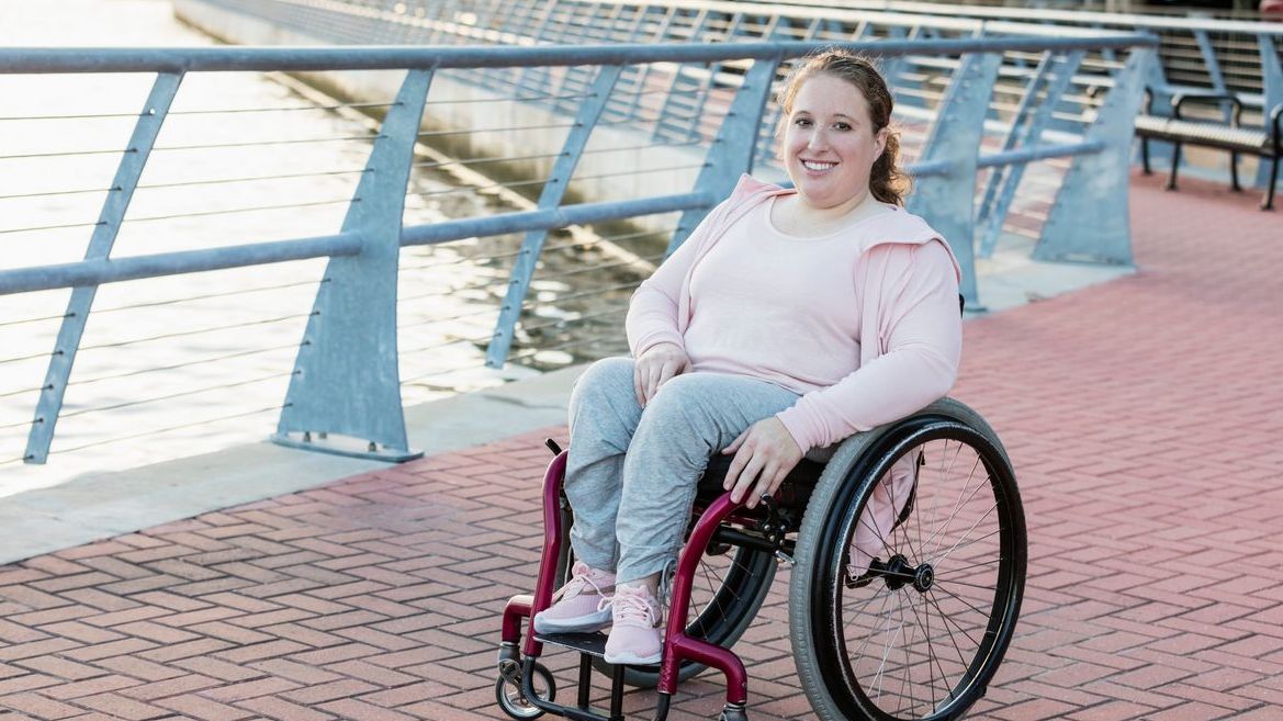 Girl with spina bifida in a wheelchair
