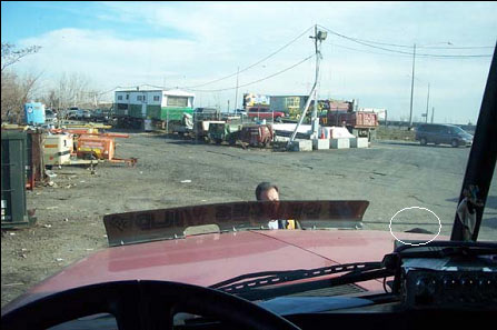 driver's field of view inside of tanker truck. pedestrian in front of truck can barely been seen.