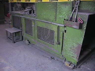 View of the inoperative safety bar wired to the machine.