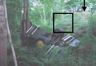 overturned mower