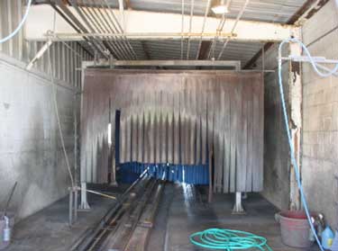 Exhibit 2. The car wash tunnel looking from the tunnel entrance.