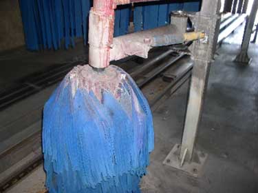 Exhibit 4: A close-up view of the side arm brush.