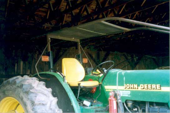 Figure 4 - The operator's area and wire guard with the roof installed.