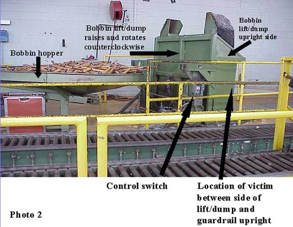 Location of lift/dump and guardrail upright where the victim was pinned.
