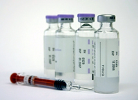 Four viles and a syringe.