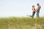 couple in grassy field