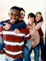 Smiling teen couples