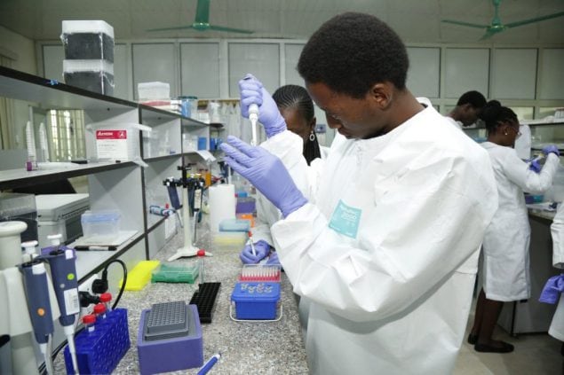Scientists preparing samples in a lab of the Africa Centres for Disease Control and Prevention