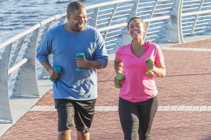 Photo of a man and woman jogging