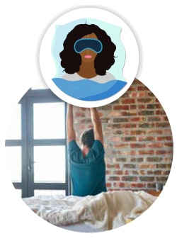 woman wearing sleep mask, man sitting on bed and stretching 
