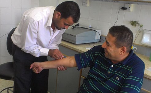 Tuberculosis testing at a health facility in Marfraq Governorate, Jordan (Source: Susan Cookson, CDC)