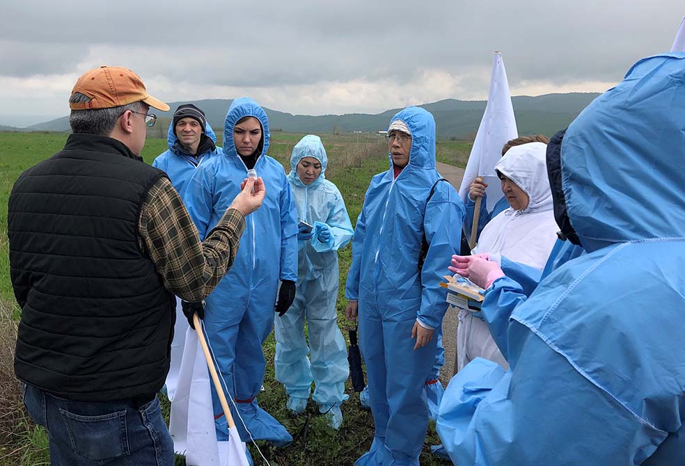 As part of a 2019 cooperative rickettsial disease surveillance in Pavlodar Oblast, Kazakhstan, staff receive training in tick collection and laboratory testing.