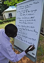 Taking notes at a training workshop in South Sudan, July 2012