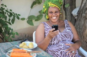 Tanzania Women on her phone