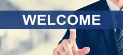 Businessman hand touching WELCOME sign on virtual screen