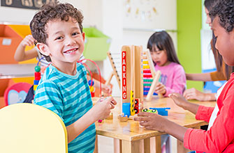 Children play in a preschool classroom