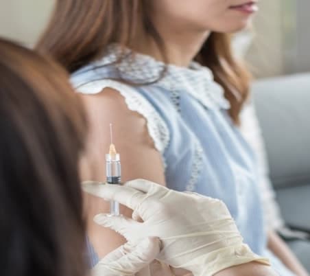 young girl getting hpv vaccine