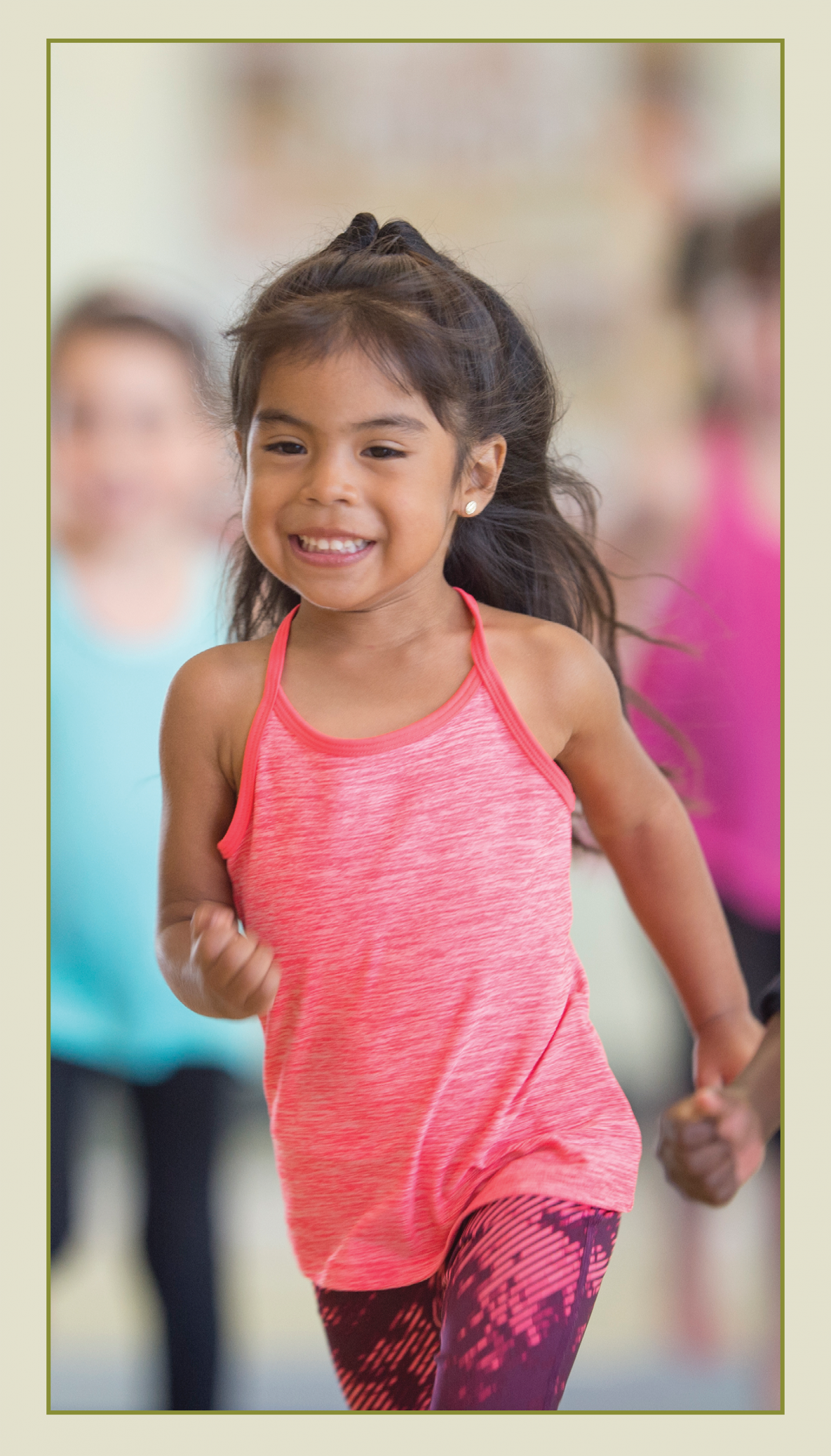 A smiling, little girl running. 