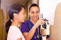 nurse weighing a teenage girl