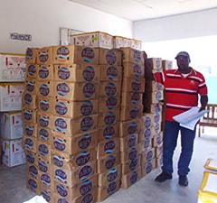 Boxes of soap are ready in a warehouse in Cameroon. One bar will be given to each person who receives the oral cholera vaccine, along with instructions on the importance of handwashing to prevent disease