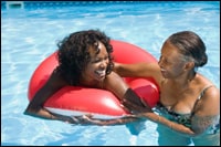 Photo: Two women in a swimming pool