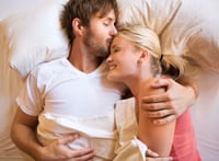 image of a couple in bed