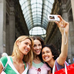 Photo of a three women taking a photo