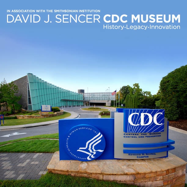 sign on the side of a road with David J Sencer CDC Museum name