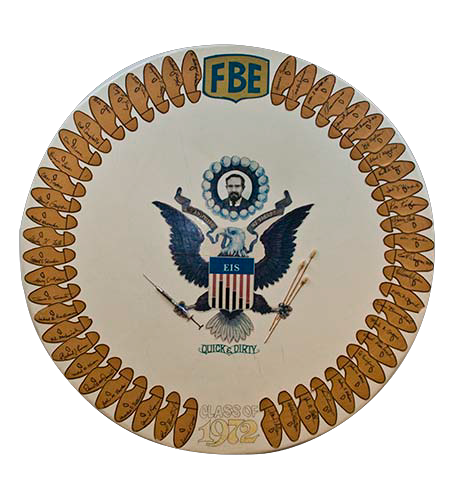 Obviously a parody of the national coat of arms from the obverse of the Great Seal of the United States, the Class of 1972 placard