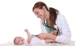 Doctor examining baby
