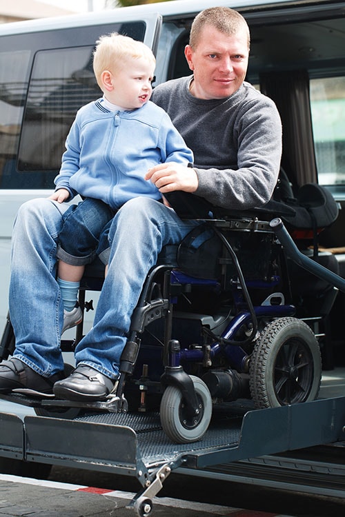 Disabled Men with son on Wheelchair