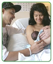Image of a couple with a newborn