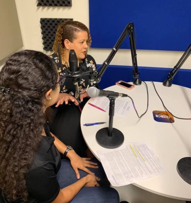 Thamara Labrousse, right, in a radio interview about increasing access to healthy food.