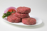 beef patties on a plate.