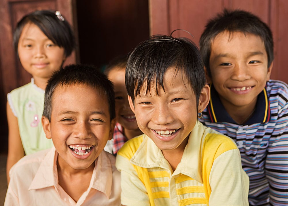 Group of happy Burmese children