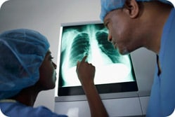doctors viewing chest x-ray