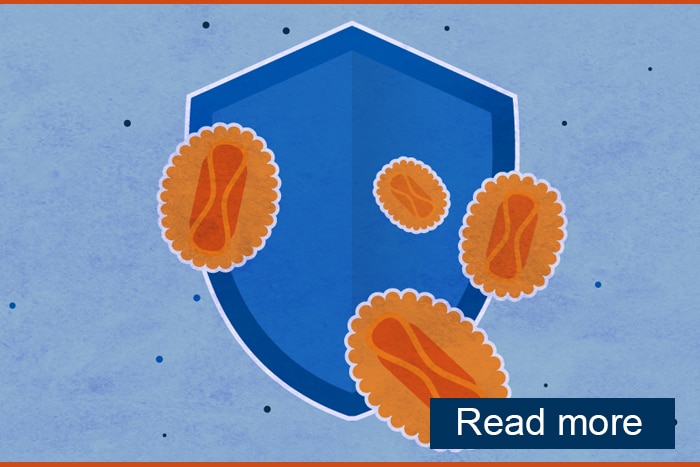 Blue shield with orange round shapes representing monkeypox superimposed on top