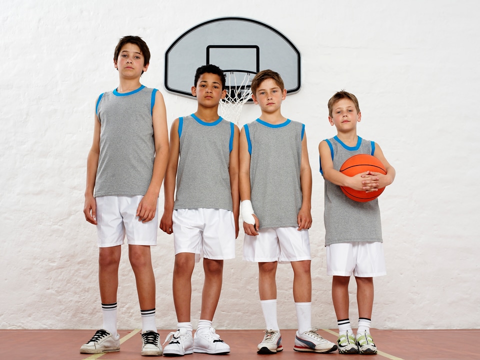 four basketball player boys