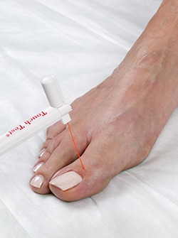 Photo of a foot being tested for feeling