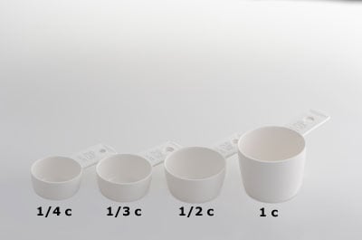 Four measuring cups of varying volume