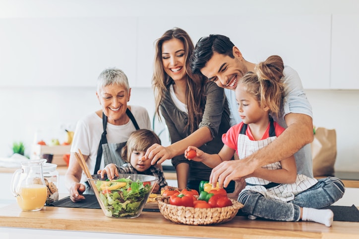Image of family cooking together