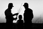 silhouette of two farmers and a child