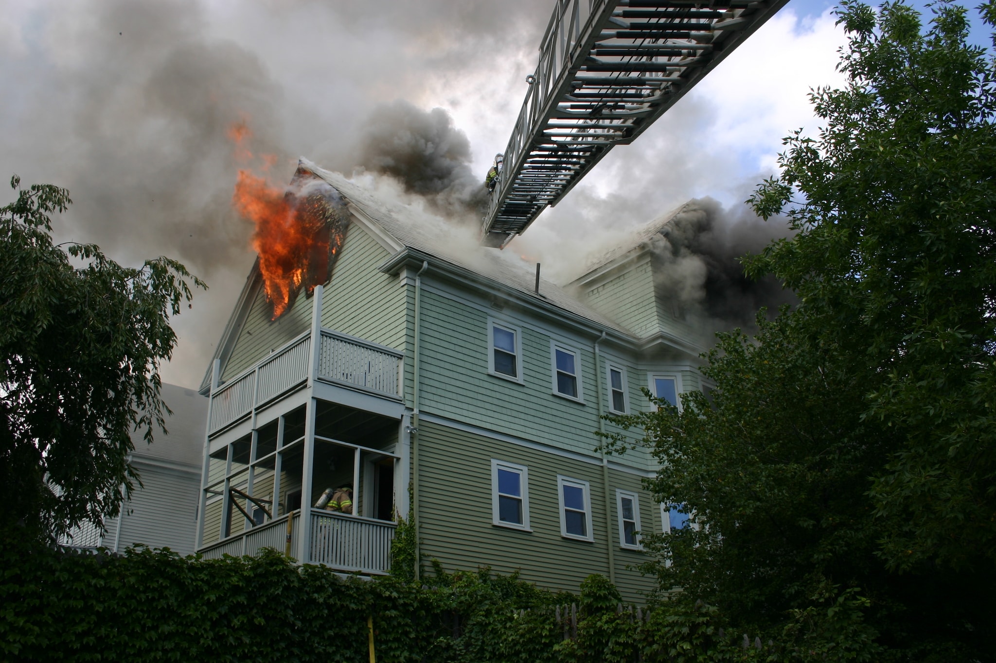 A Massachusetts house fire resulting from the use of highly flammable floor finishing products. Photo by Dean Razzaboni.