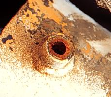 photo of hydraulic line input showing broken edge of nipple