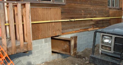 Figure 3. Beam extending past concrete block foundation