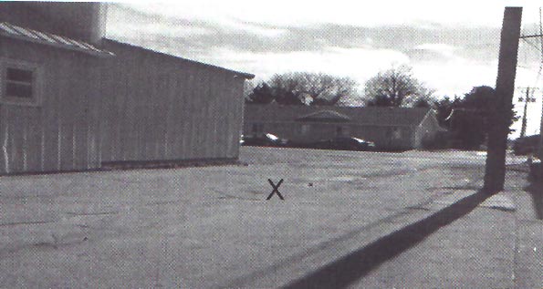 Picture 5.  Alleyway where accident occurred looking south