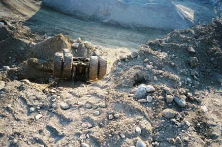 View of the truck looking down from the top of the embankment.